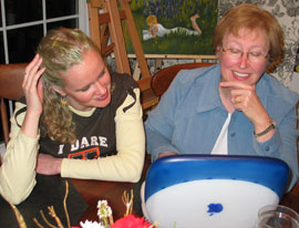 Erica and Andrew's Mom look at wedding plans online